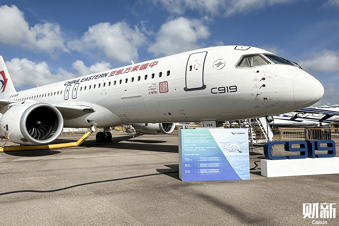 A Comac-developed C919 aircraft gets showcased at the Singapore Airshow on Tuesday. Photo: Caixin
