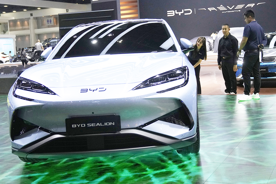 Visitors to the 45th Bangkok Auto Show check out a BYD Sealion electric car on March 26. Photo: VCG