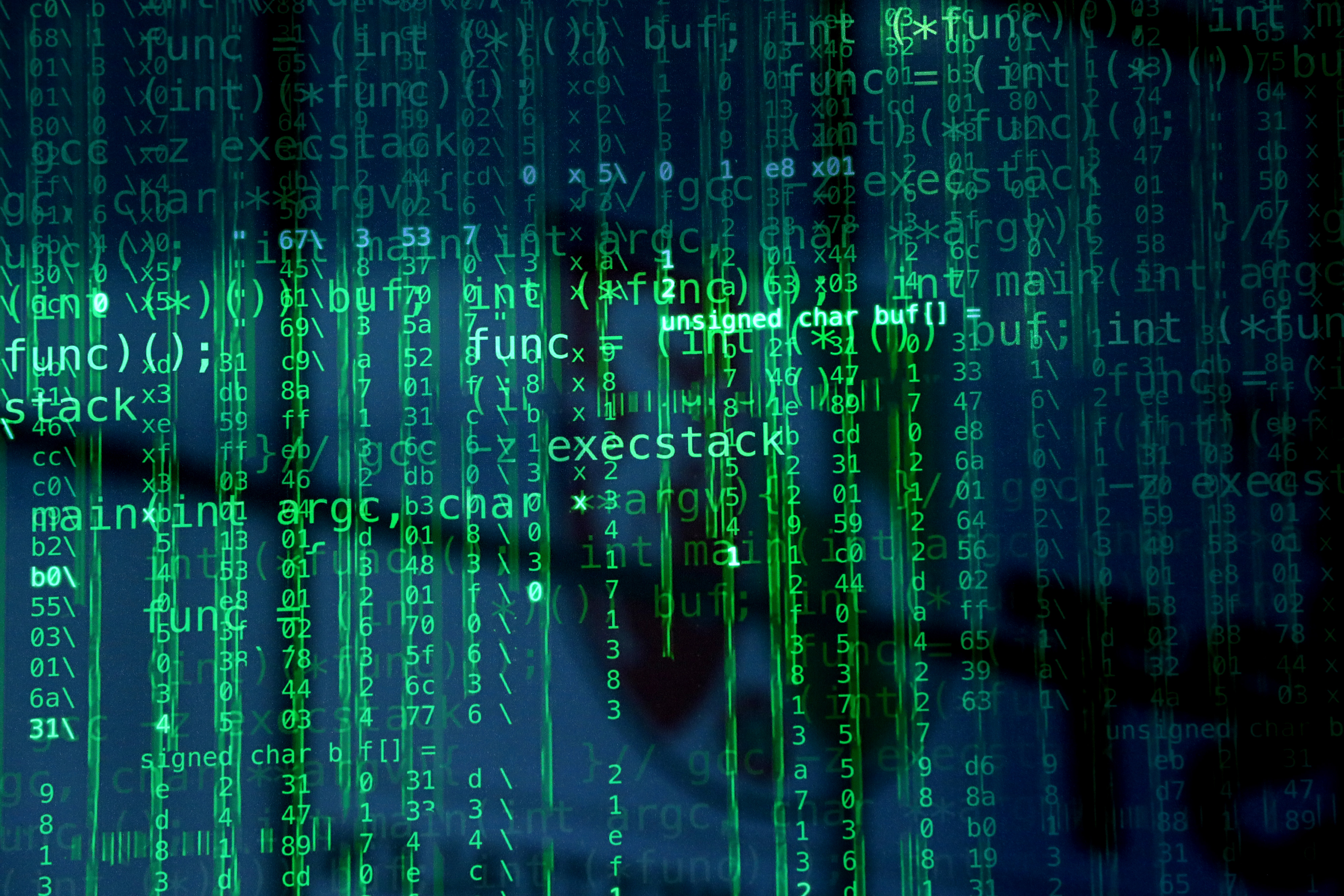 A display of computer coding sits on a glass panel in the Airbus SE Defence and Space CyberSecurity pavilion at a tech fair in Hannover, Germany, in March 2017. Photo: Bloomberg
